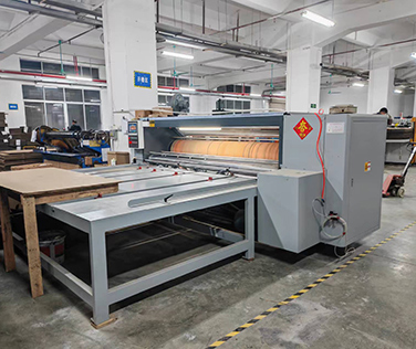 Slotting and creasing machine for carton factories